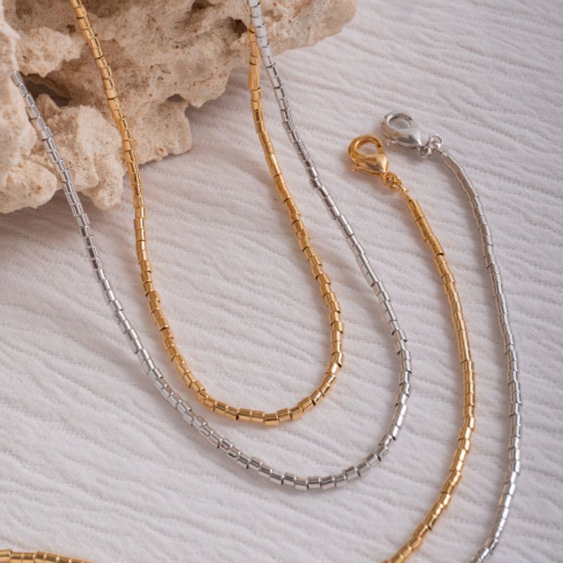 COLAR CHOKER TUBINHO ARTICULADO EM BANHO DE OURO 18K