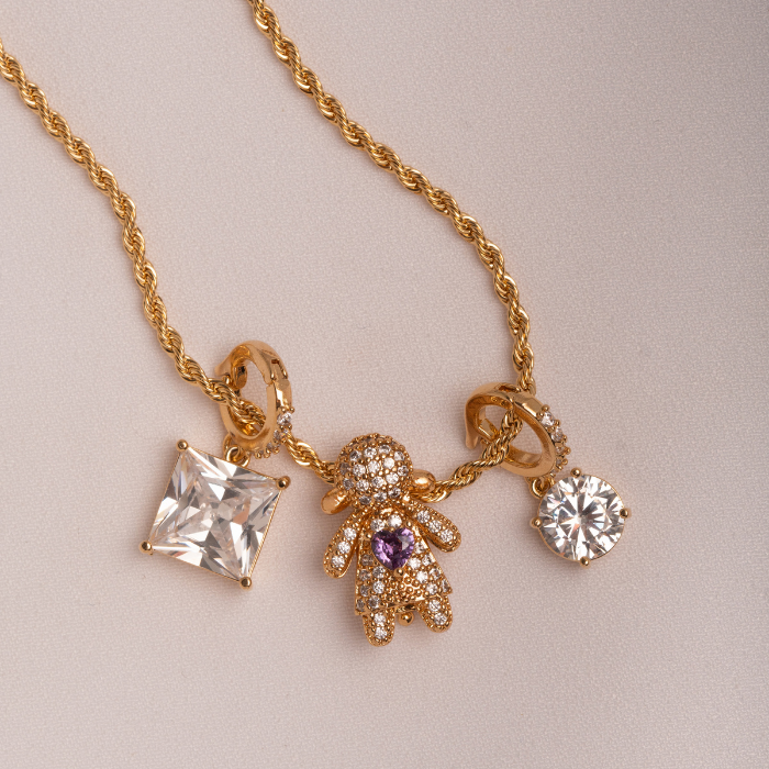 PINGENTE PONTO DE LUZ COM ARGOLA CRAVEJADA  BANHO DE OURO 18K