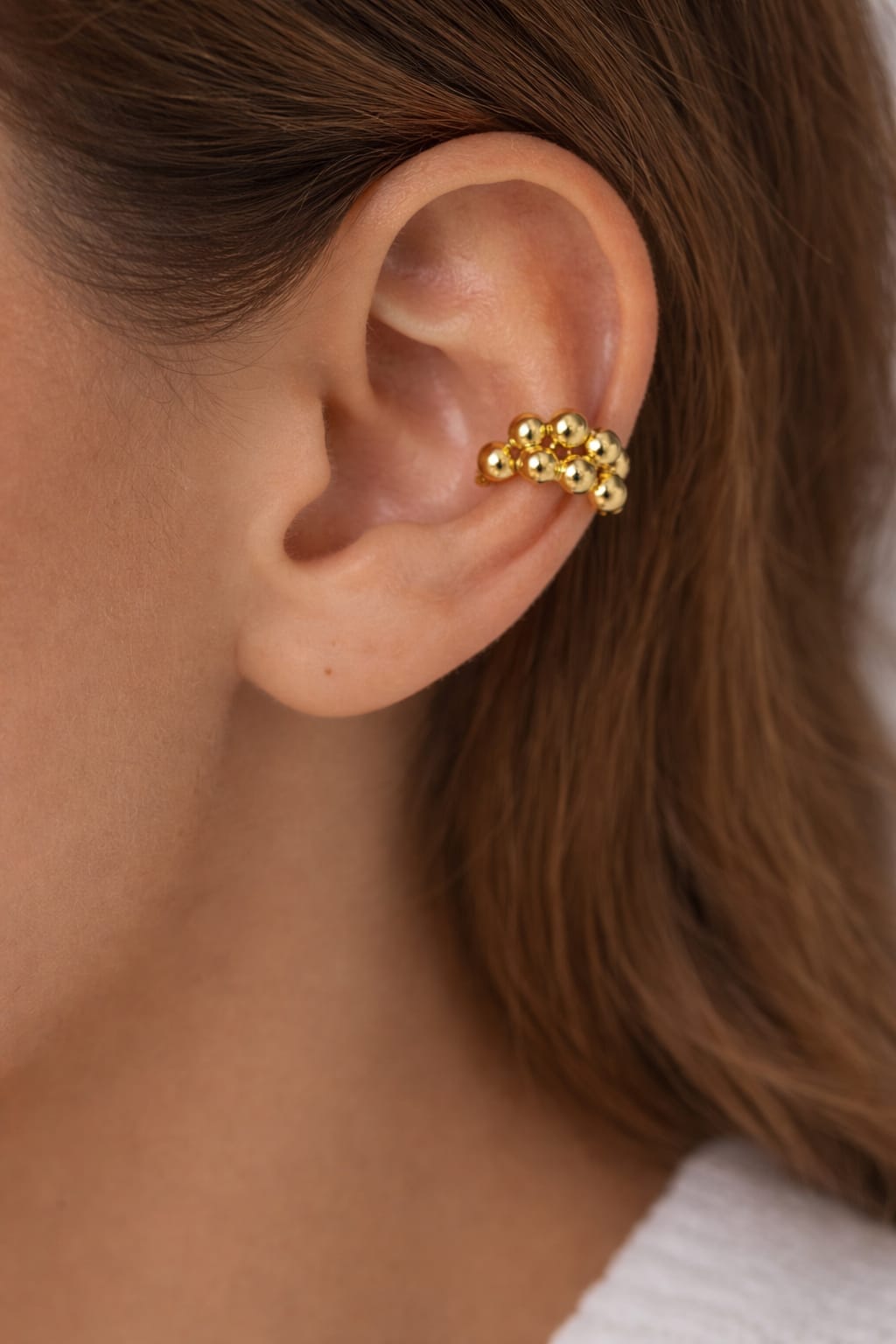 PIERCING FAKE DE BOLINHAS DOURADAS