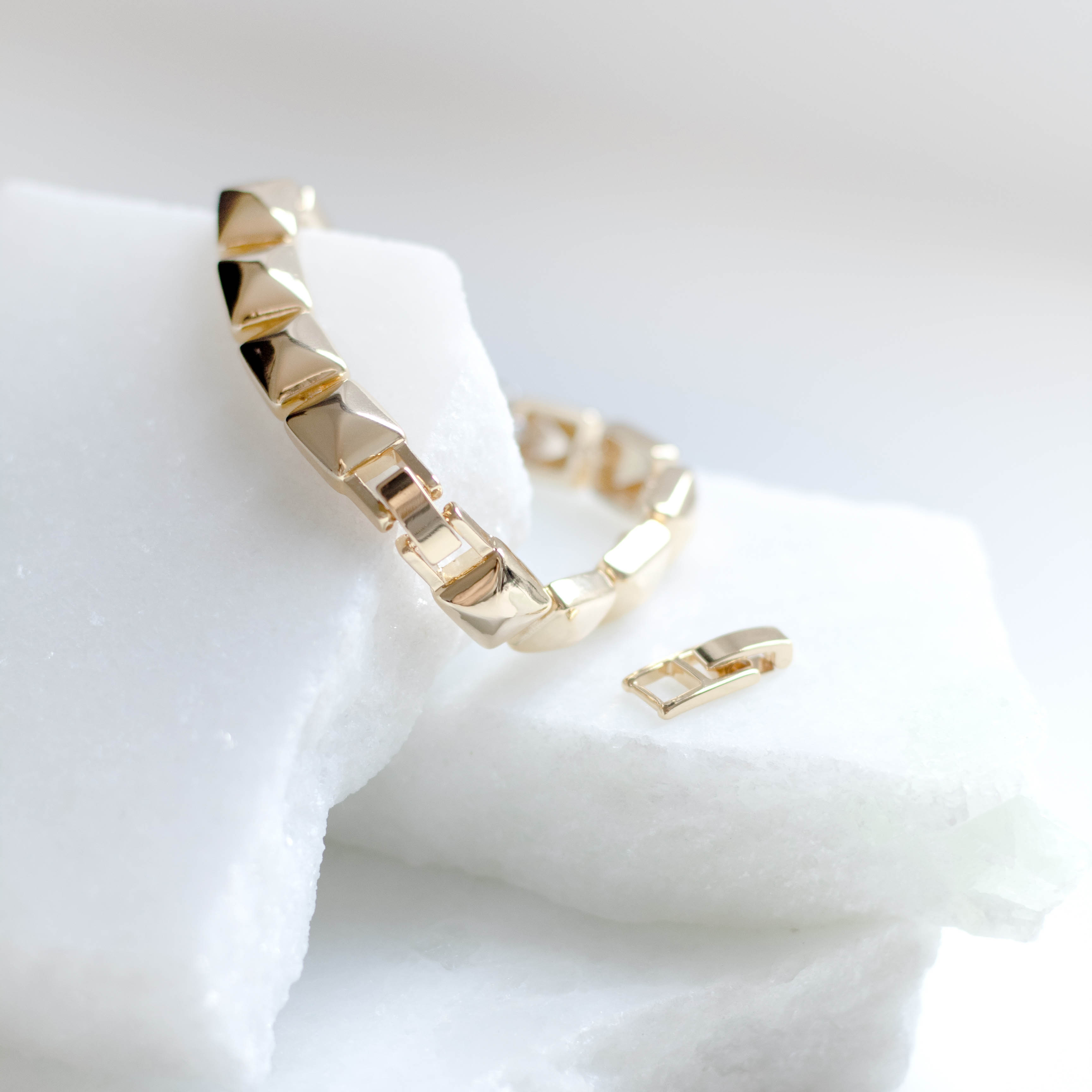 Pulseira Gomos Lisos banhado a Ouro 18k  e 1 cravejado no Ouro Branco