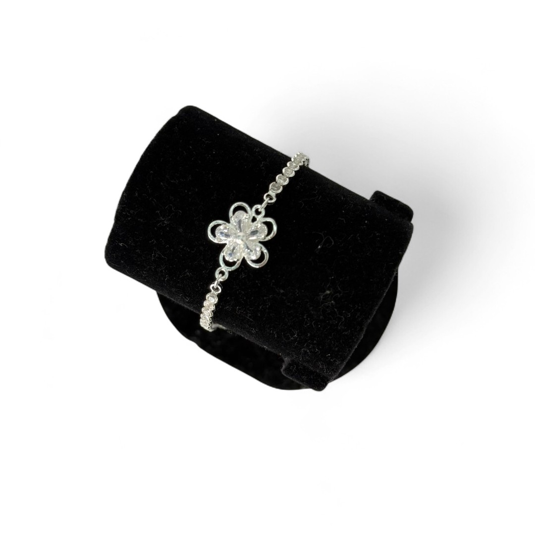 PULSEIRA RIVIERA ZIRCONIA CRISTAL REDONDA COM FLOR CENTRAL E EXTENSOR  - BANHADO A PRATA 925
