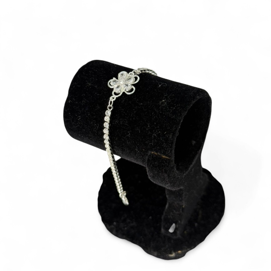 PULSEIRA RIVIERA ZIRCONIA CRISTAL REDONDA COM FLOR CENTRAL E EXTENSOR  - BANHADO A PRATA 925