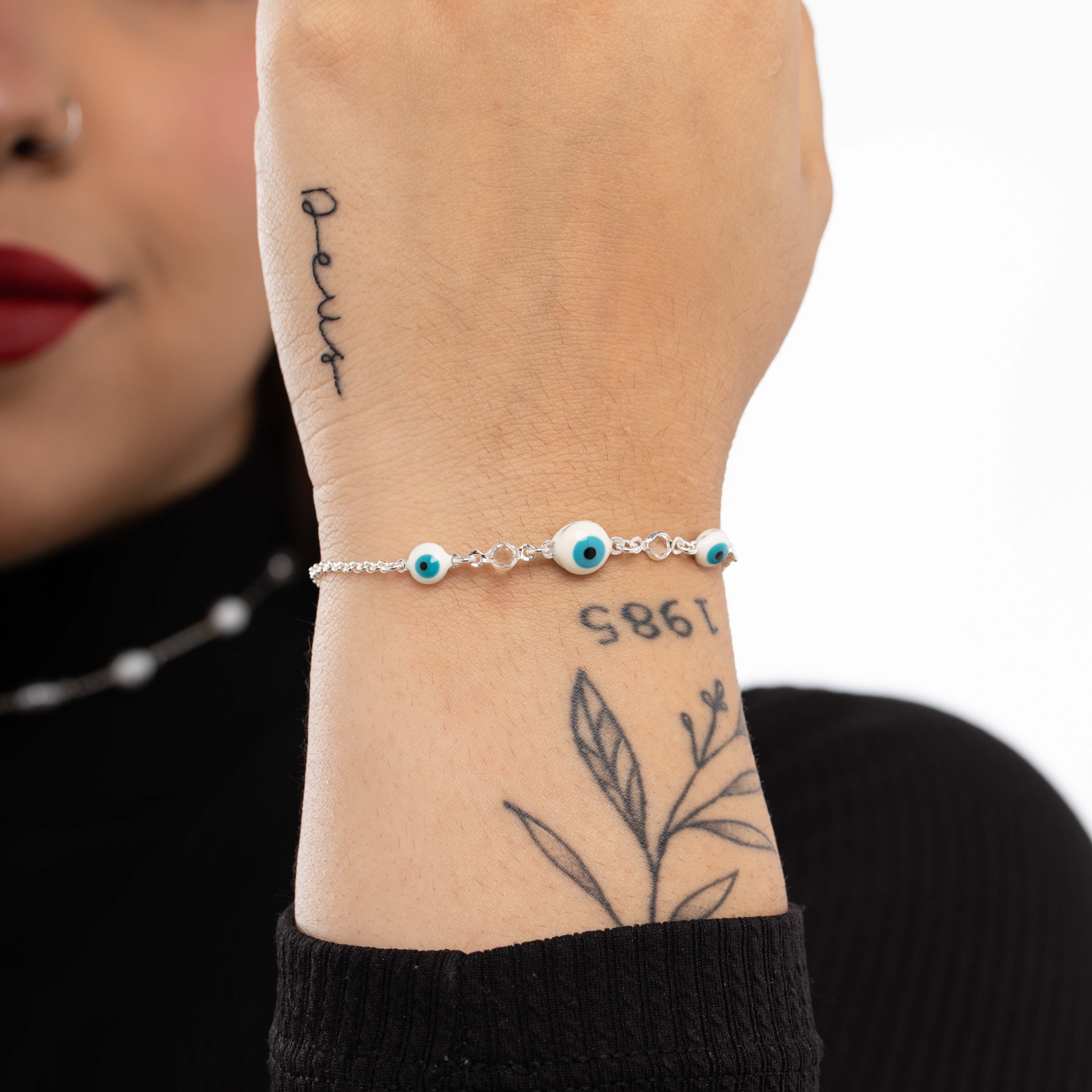 PULSEIRA ELO PORTUGUES FINO COM OLHO GREGO E PEDRA EM ACRILICO CRISTAL COM EXTENSOR - BANHADO A PRATA 925