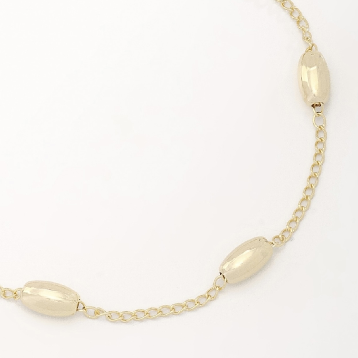 PULSEIRA COM ESFERAS OVAIS