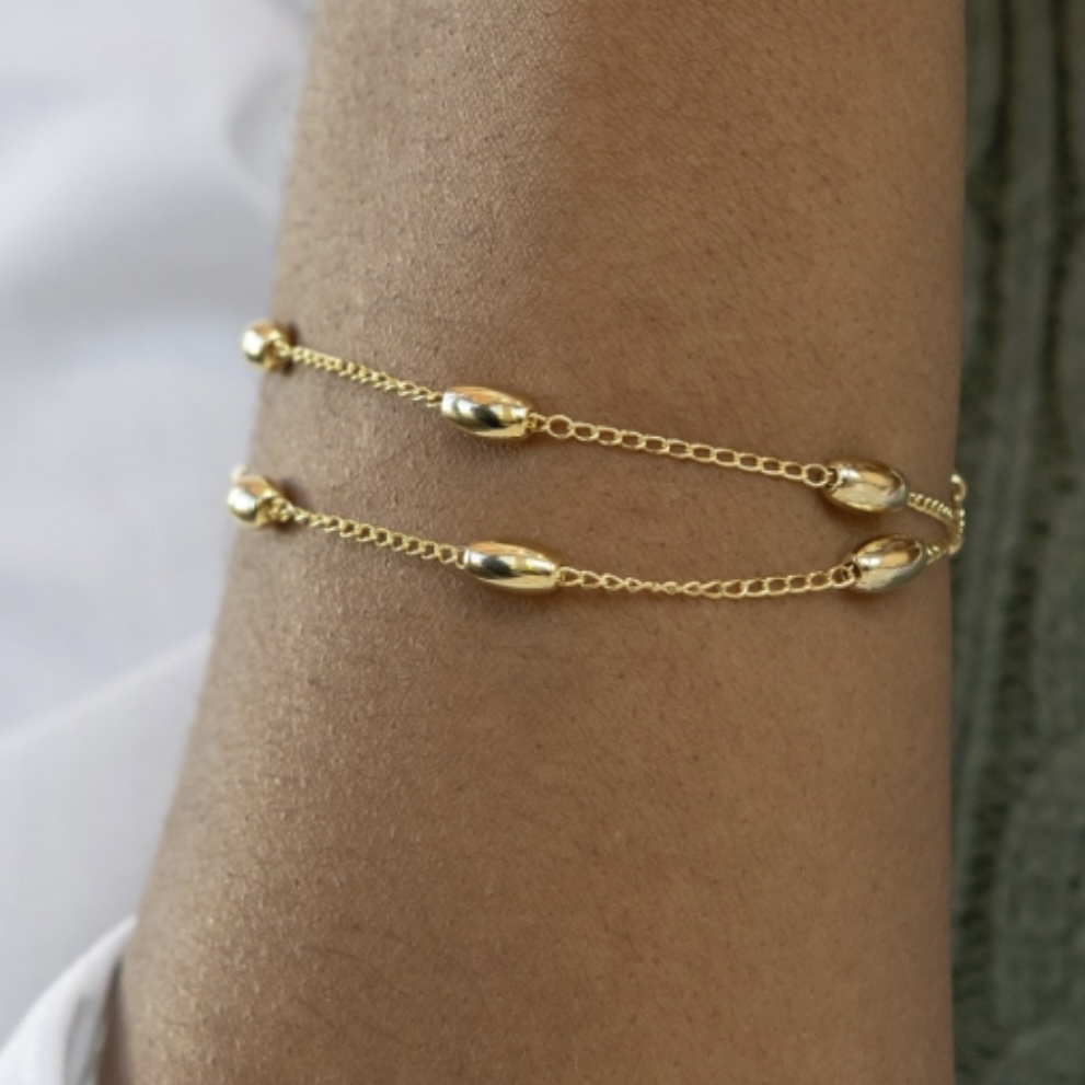 PULSEIRA COM ESFERAS OVAIS