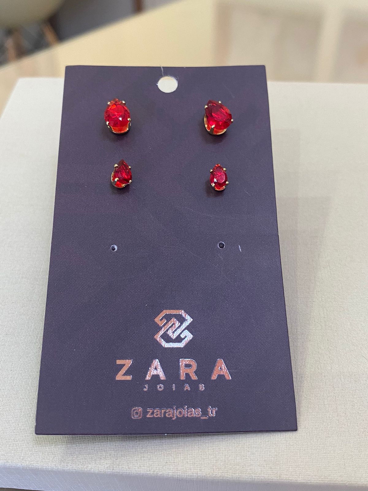 DUPLA GOTAS VERMELHAS