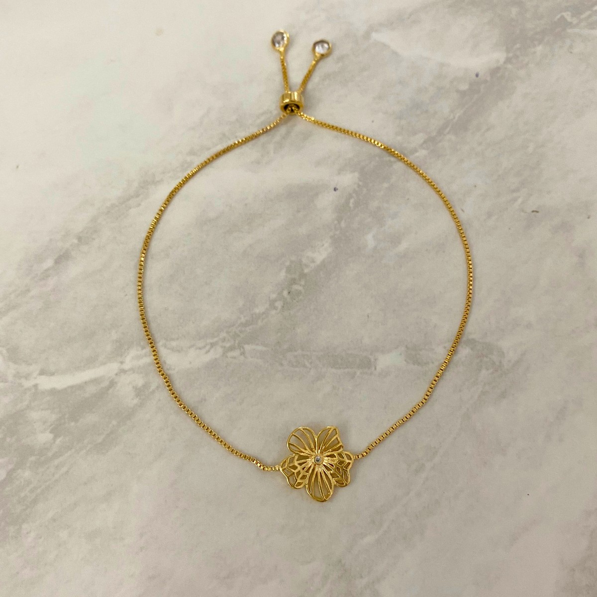 PULSEIRA REGULAVEL COM 1 FLOR GRANDE E COM 2 PONTO DE LUZ REDONDO