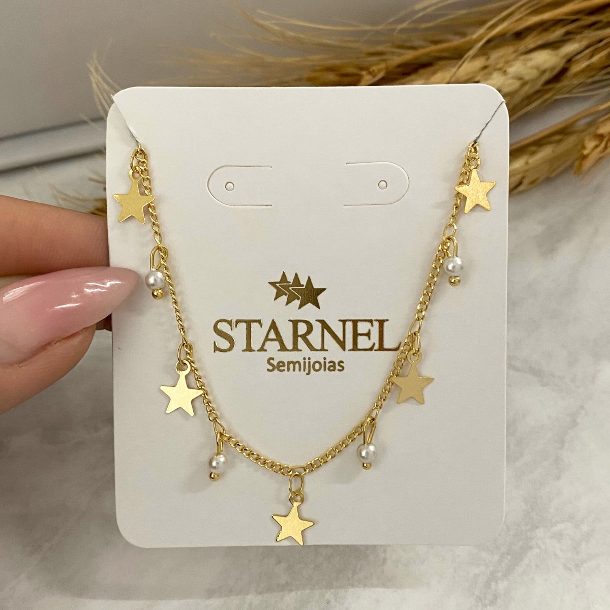 GARGANTILHA COM PINDURICALHO DE ESTRELA DE CHAPA E PEROLA
