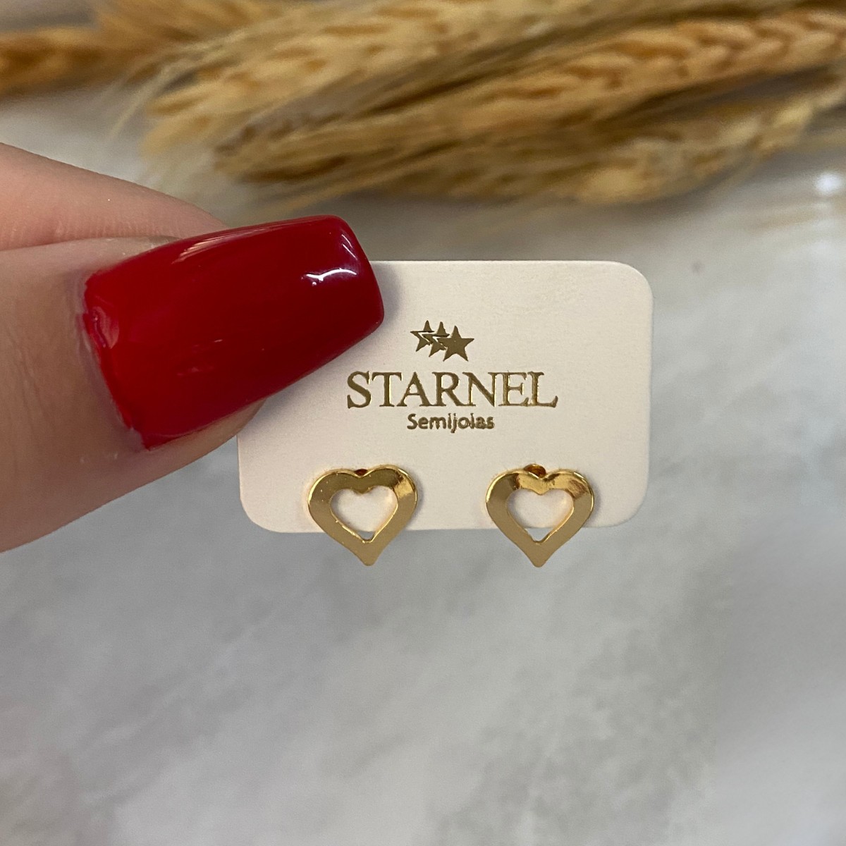 BRINCO PEQUENO CORAÇÃO CHAPA VAZADA LISA 7MM