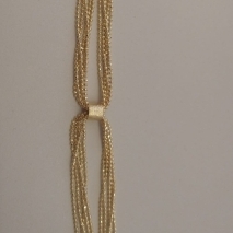 PULSIERA FO DETALHE BOLINHAS TIRAS