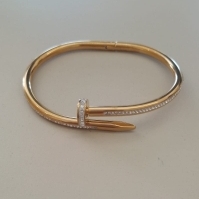 BRACELETE AÇO DOURADO PREGO STRASS