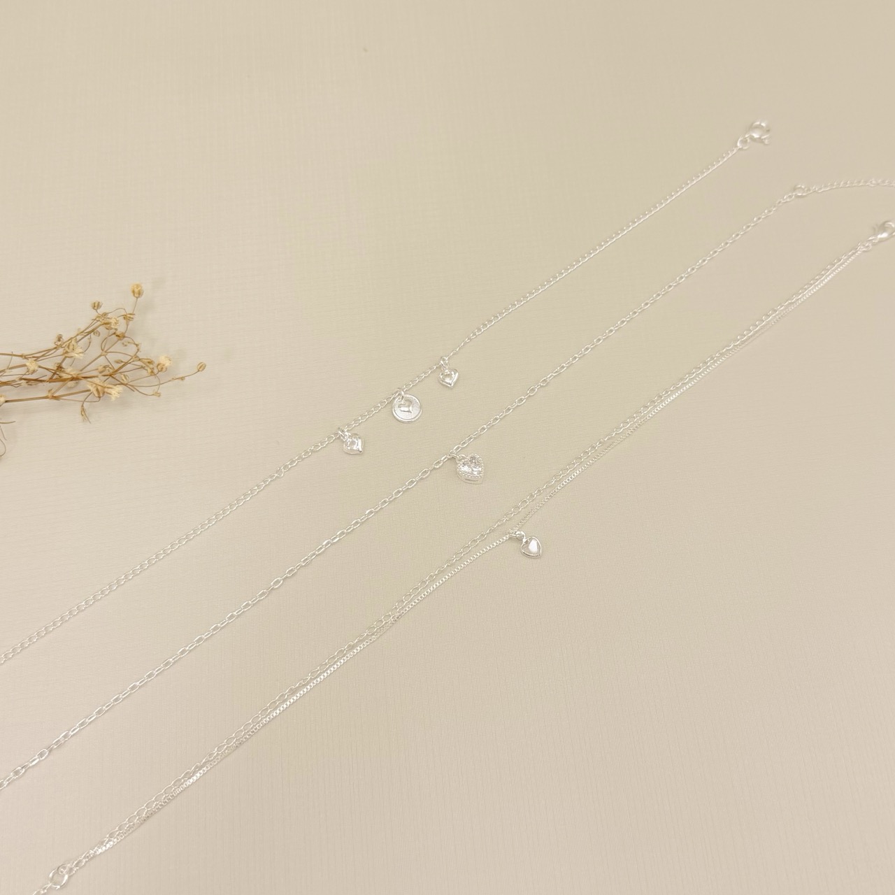 14.0687.1.S - Tornozeleira dupla de veneziana e elos clássicos com pingente de coração ponto de luz