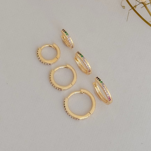 05.3042.C.O - (Tam. G) Argola circular com cravação frontal em uma coluna irregular