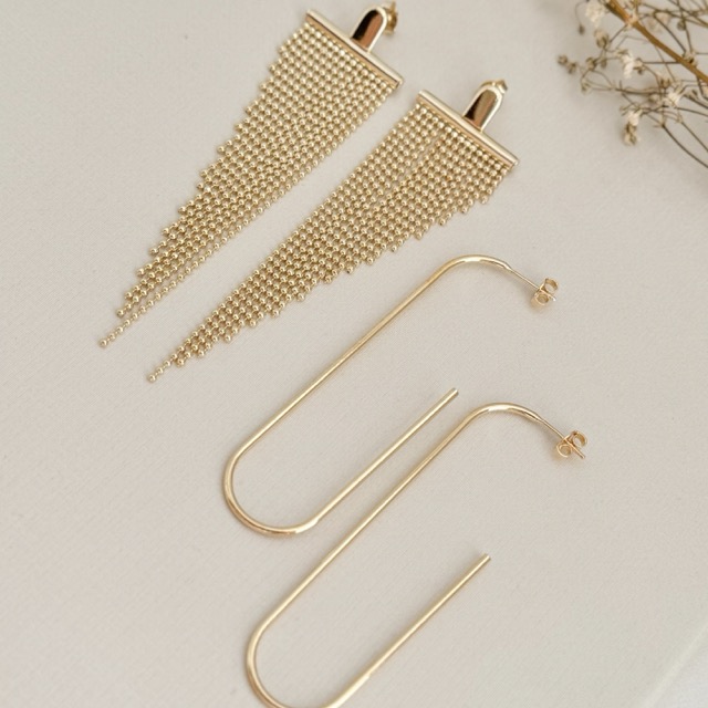 06.1837.0.O - Brinco de base tuco circular com franjas crescentes de bolinhas