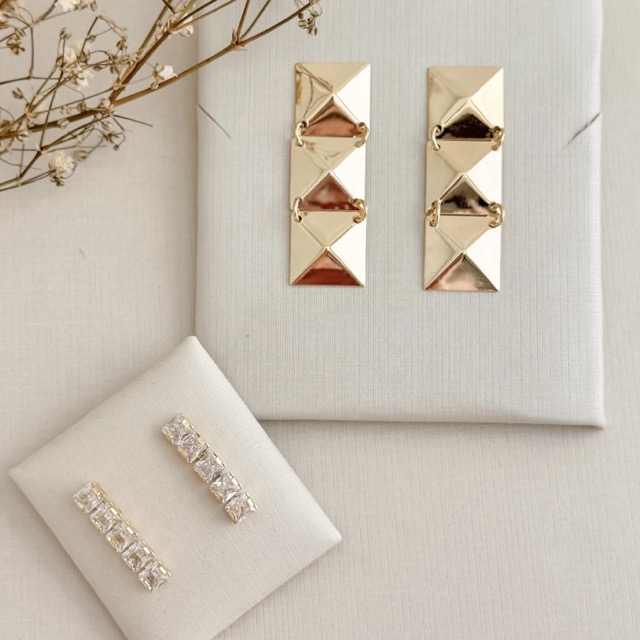 06.1839.1.O - Brinco em riviera de cinco pontos de luz retangulares