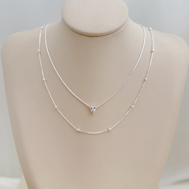 09.2375.1.S - (36) Colar com pingente de coração liso e mini ponto de luz no centro