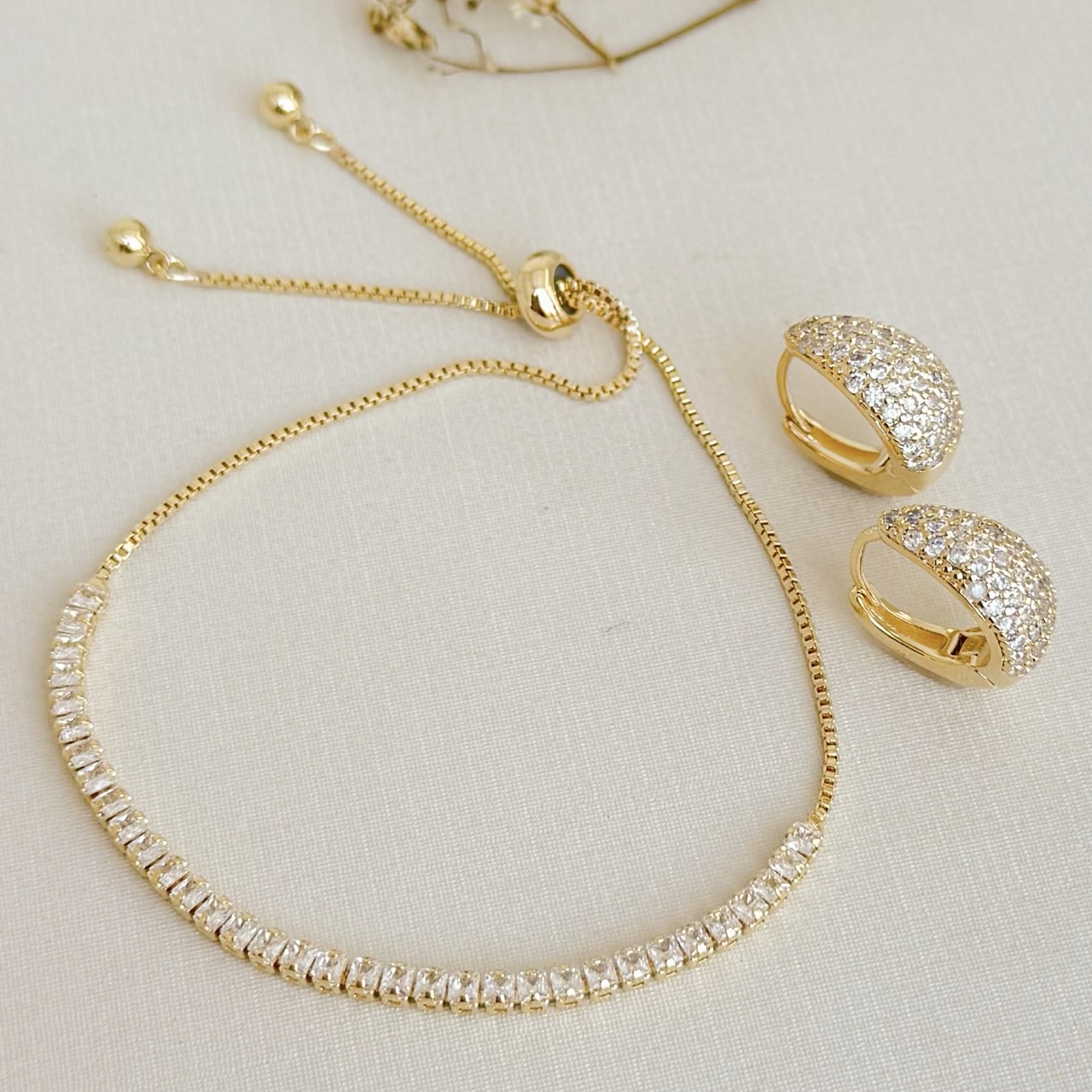 12.2210.1.O - Pulseira de riviera de duas garras com fecho gravata