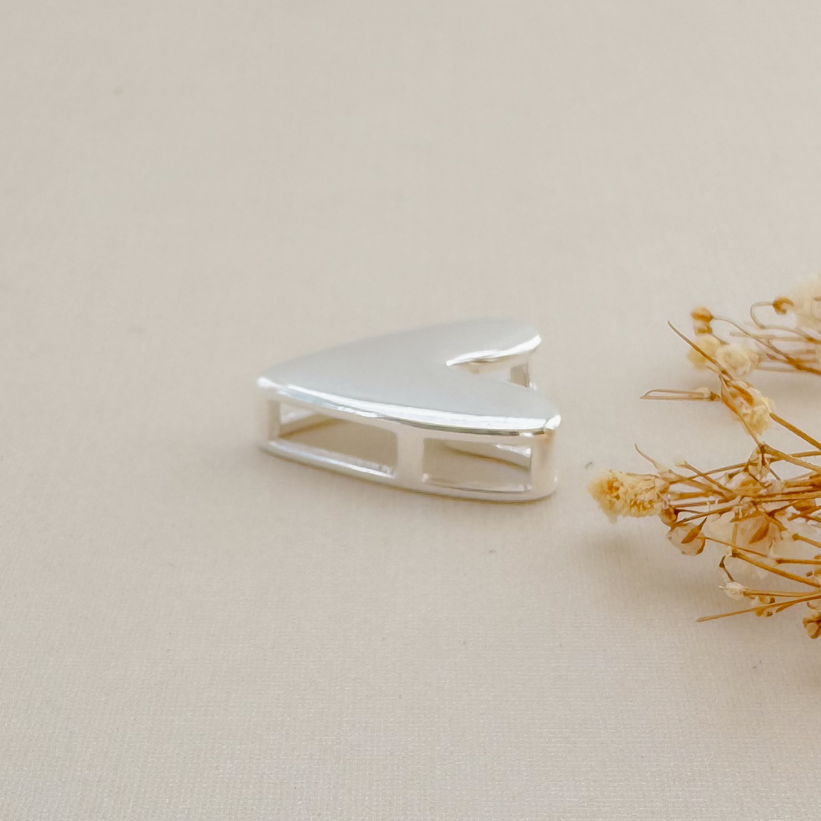 11.0604.0.S - Pingente de coração liso com galeria