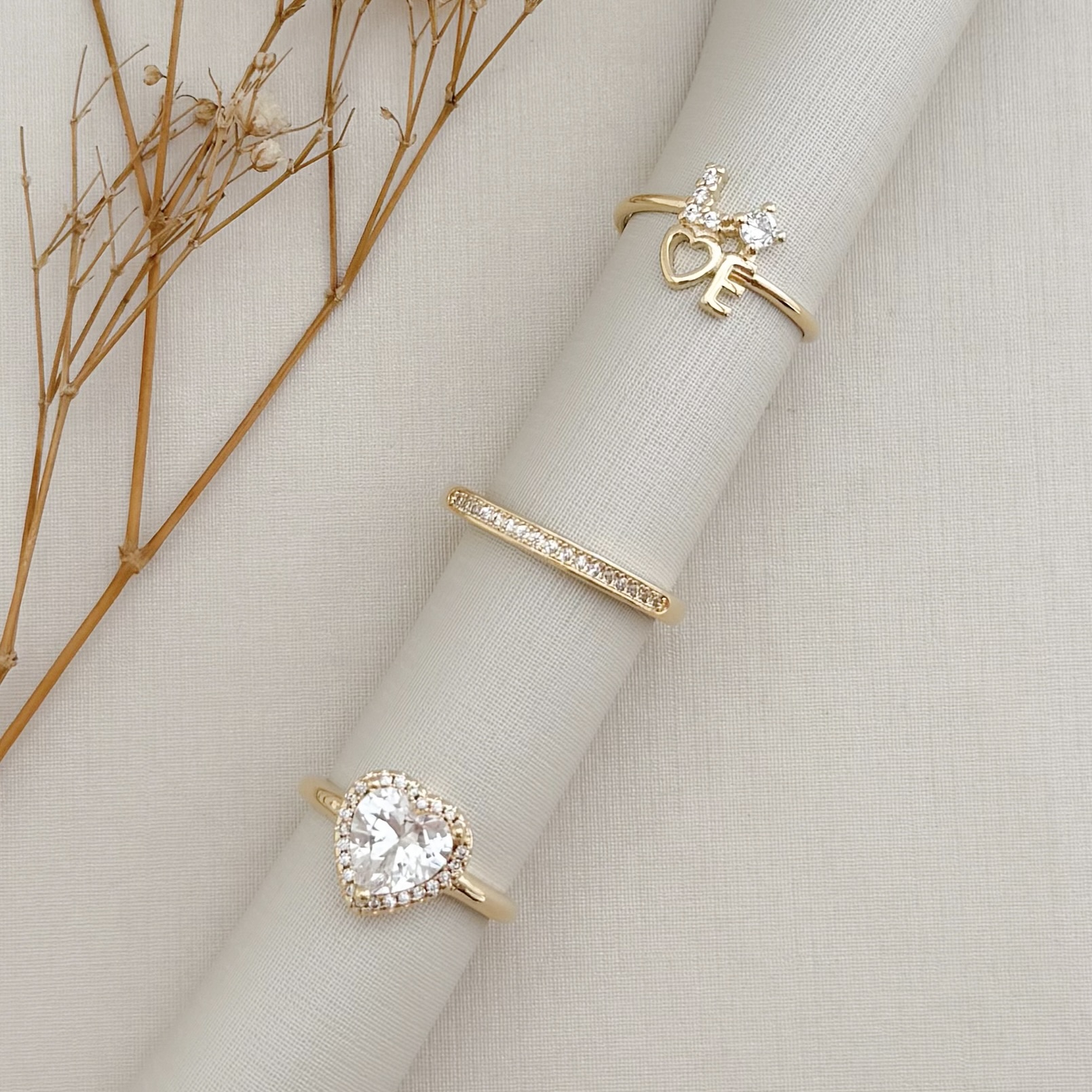 03.2434.1.O - (16) Anel aparador unico de uma linha cravejada com borda alta lisa