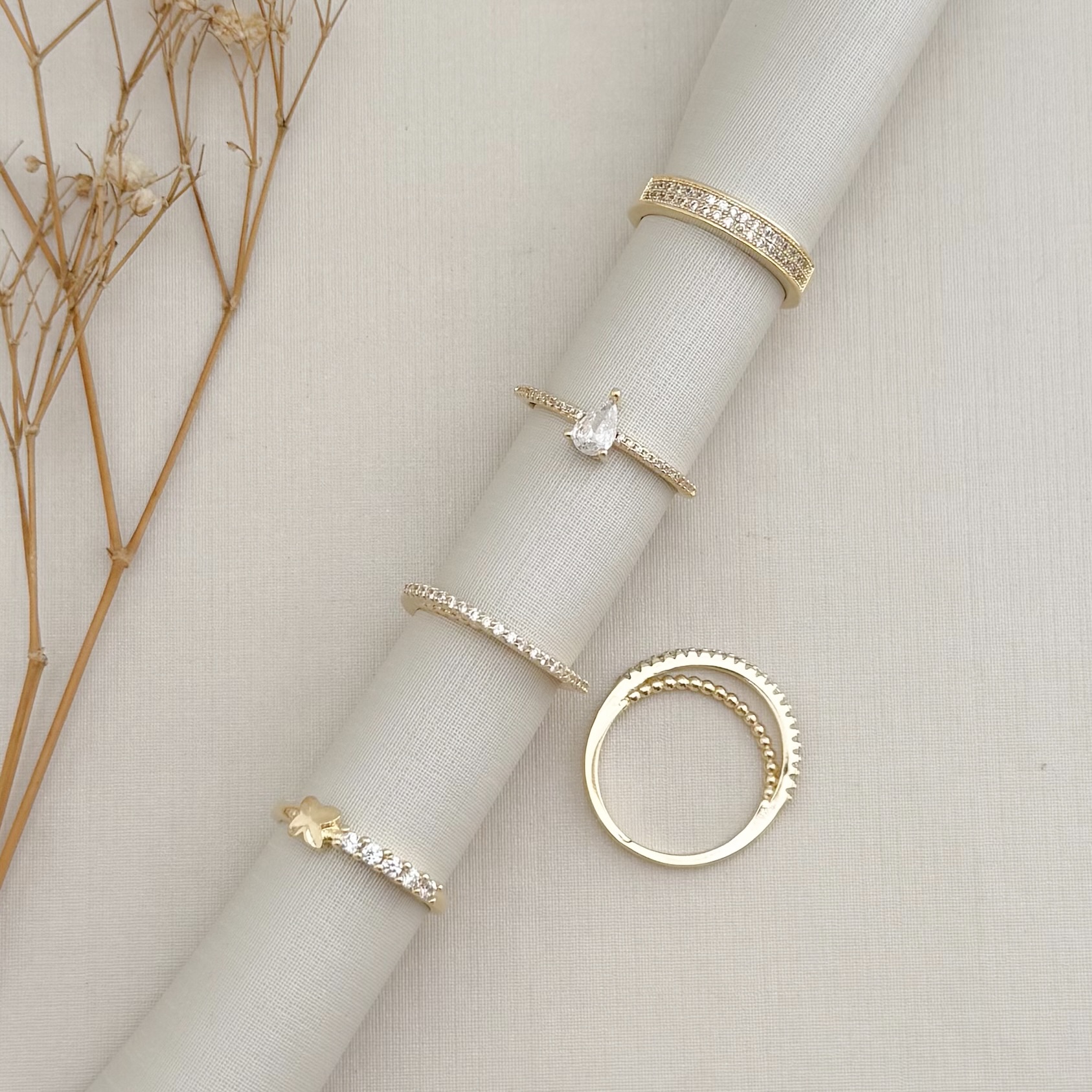 03.2439.1.O - (19) Anel de bolinhas lisas com uma linha alta cravejada por cima