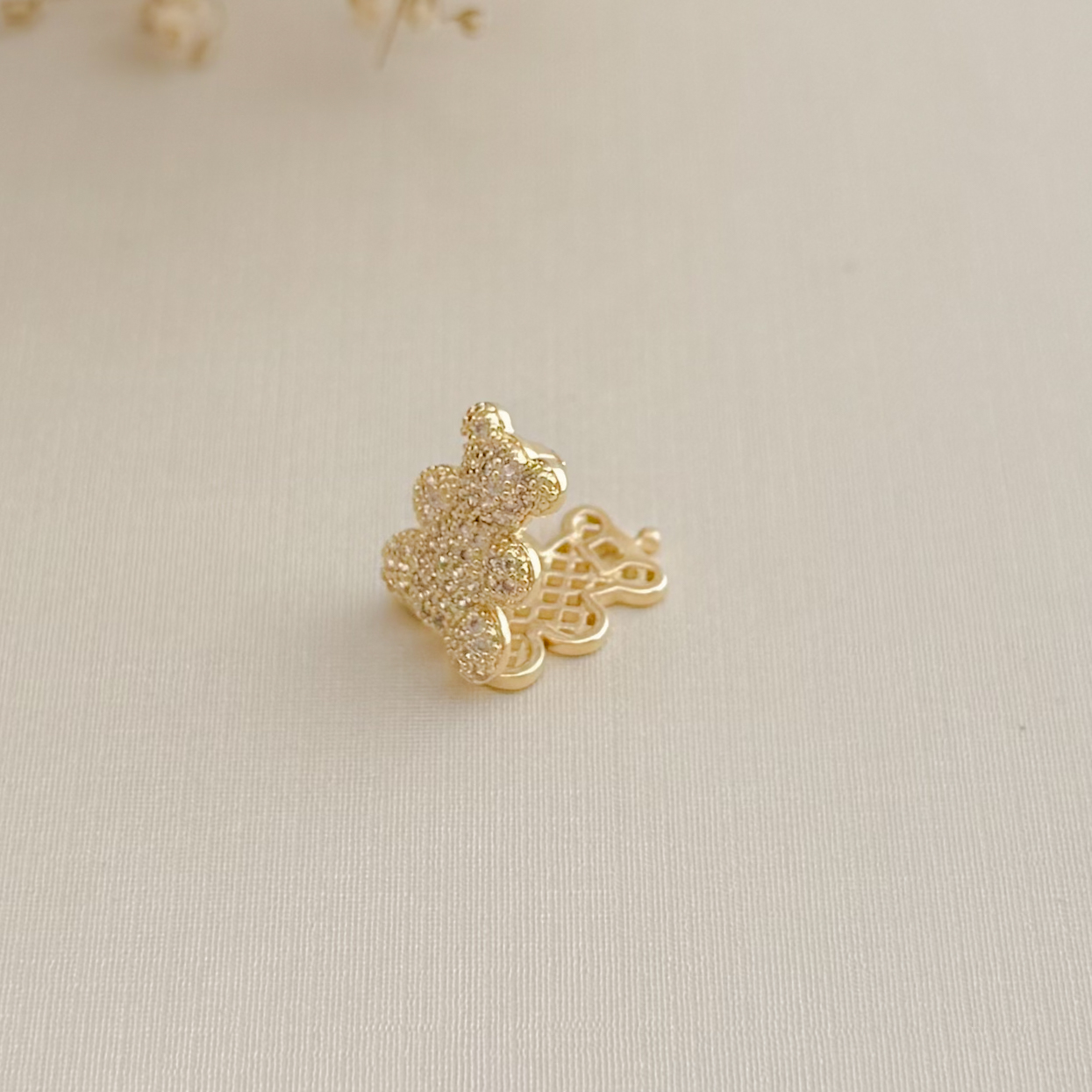 11.0605.1.O - Pingente para corrente de fita de formato ursinho cravejado