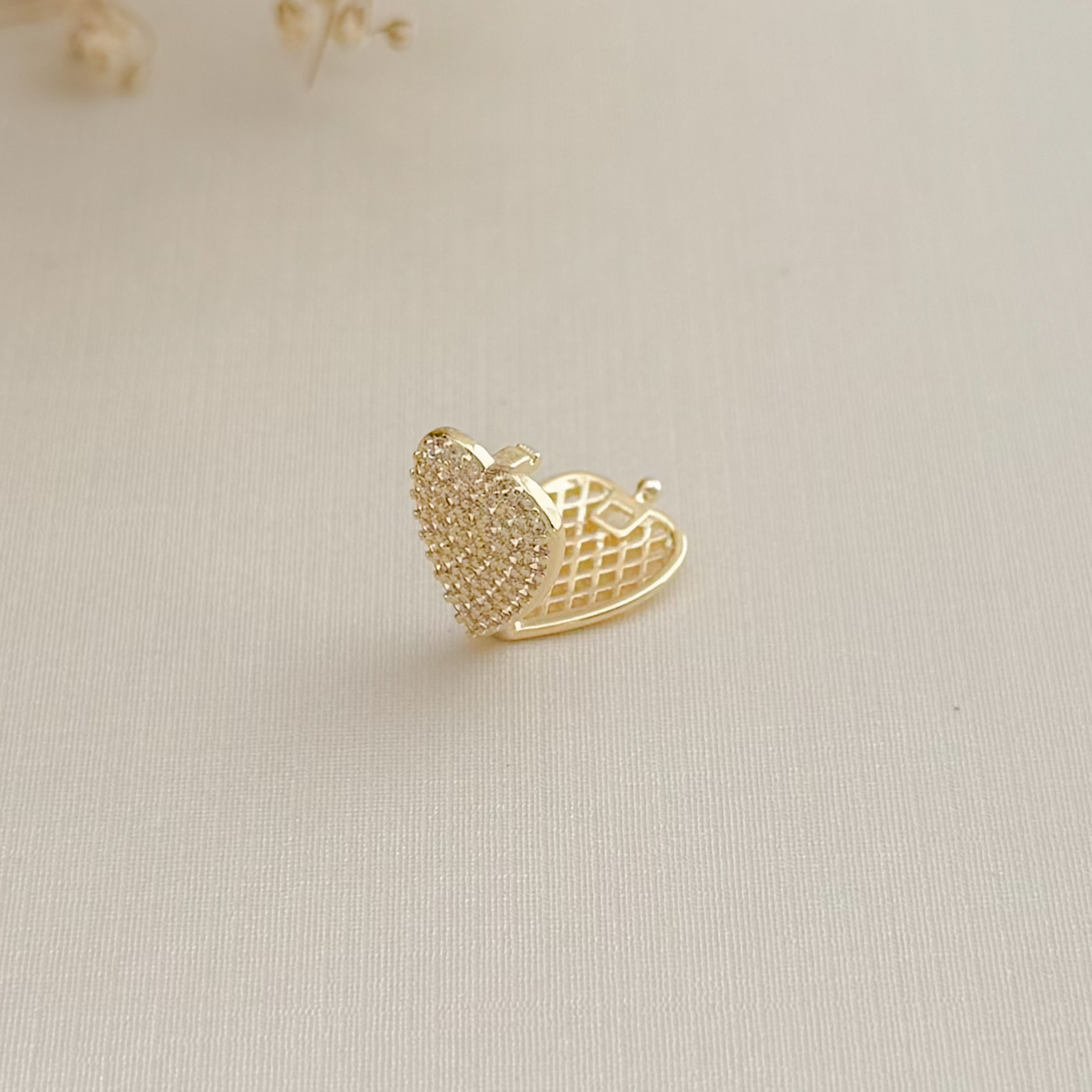 11.0606.1.O - Pingente para corrente de fita em coração longo cravejado