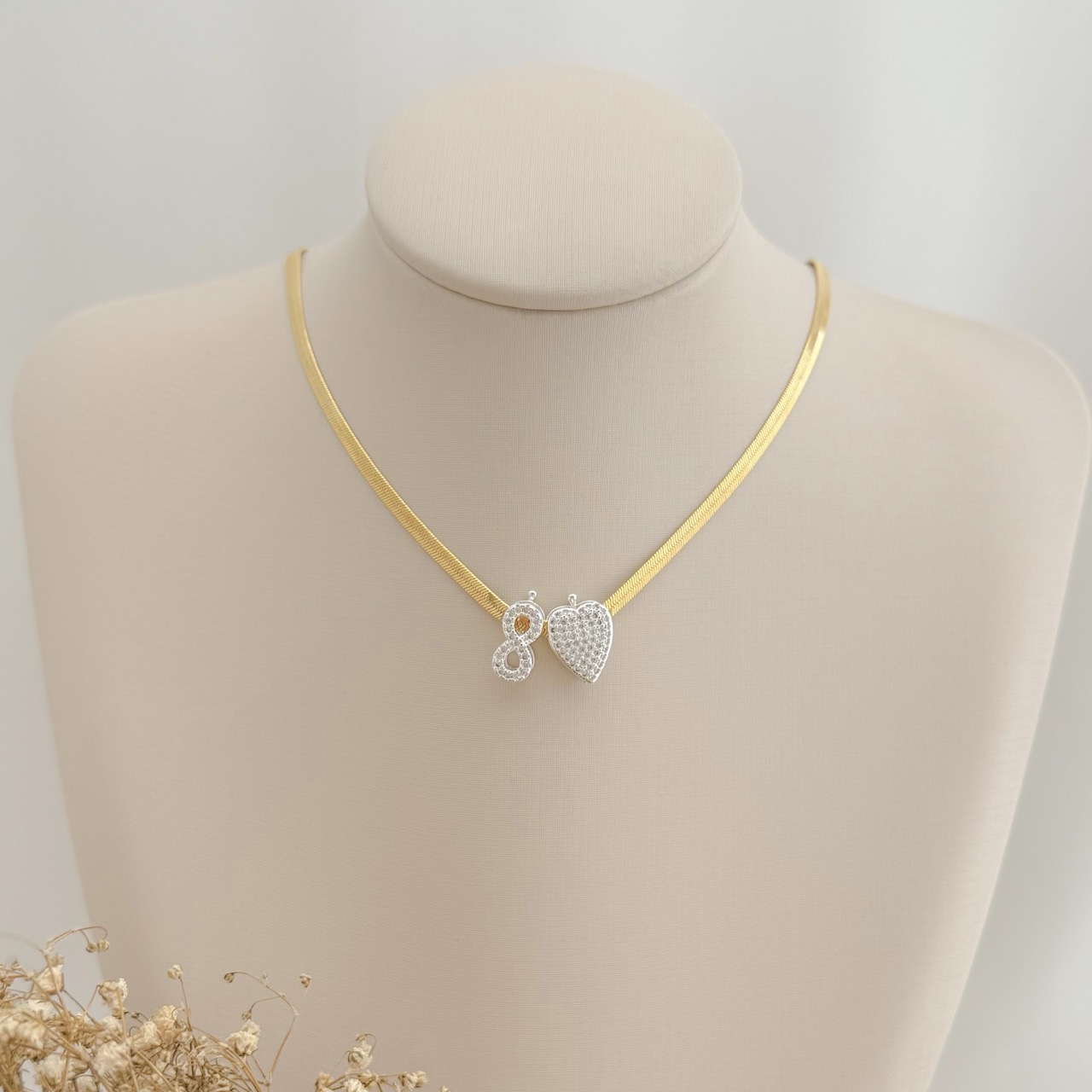 11.0607.1.S - Pingente de corrente de fita em formato infinito cravejado