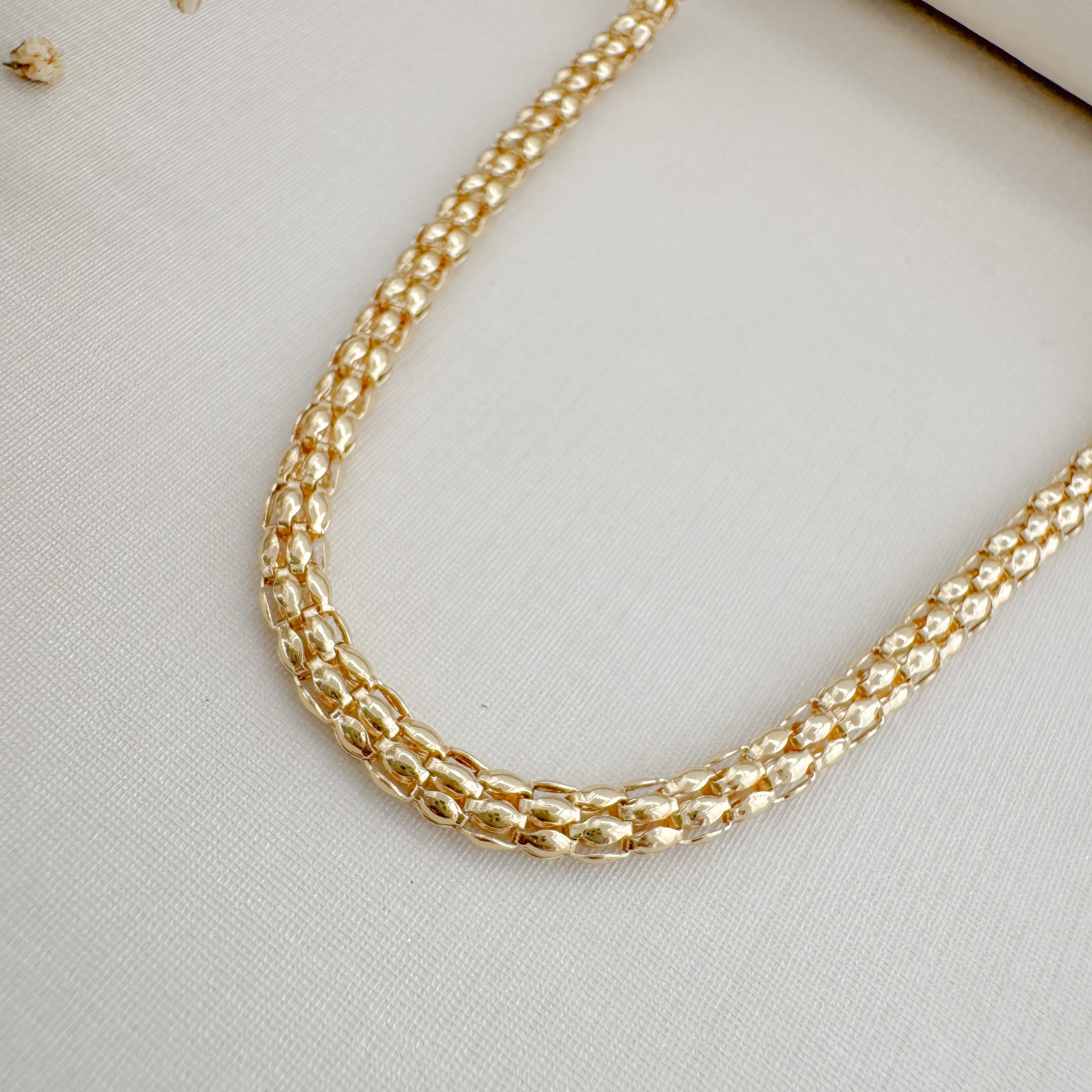 09.2398.0.O - (32) Choker de malha oca em desenho barril liso