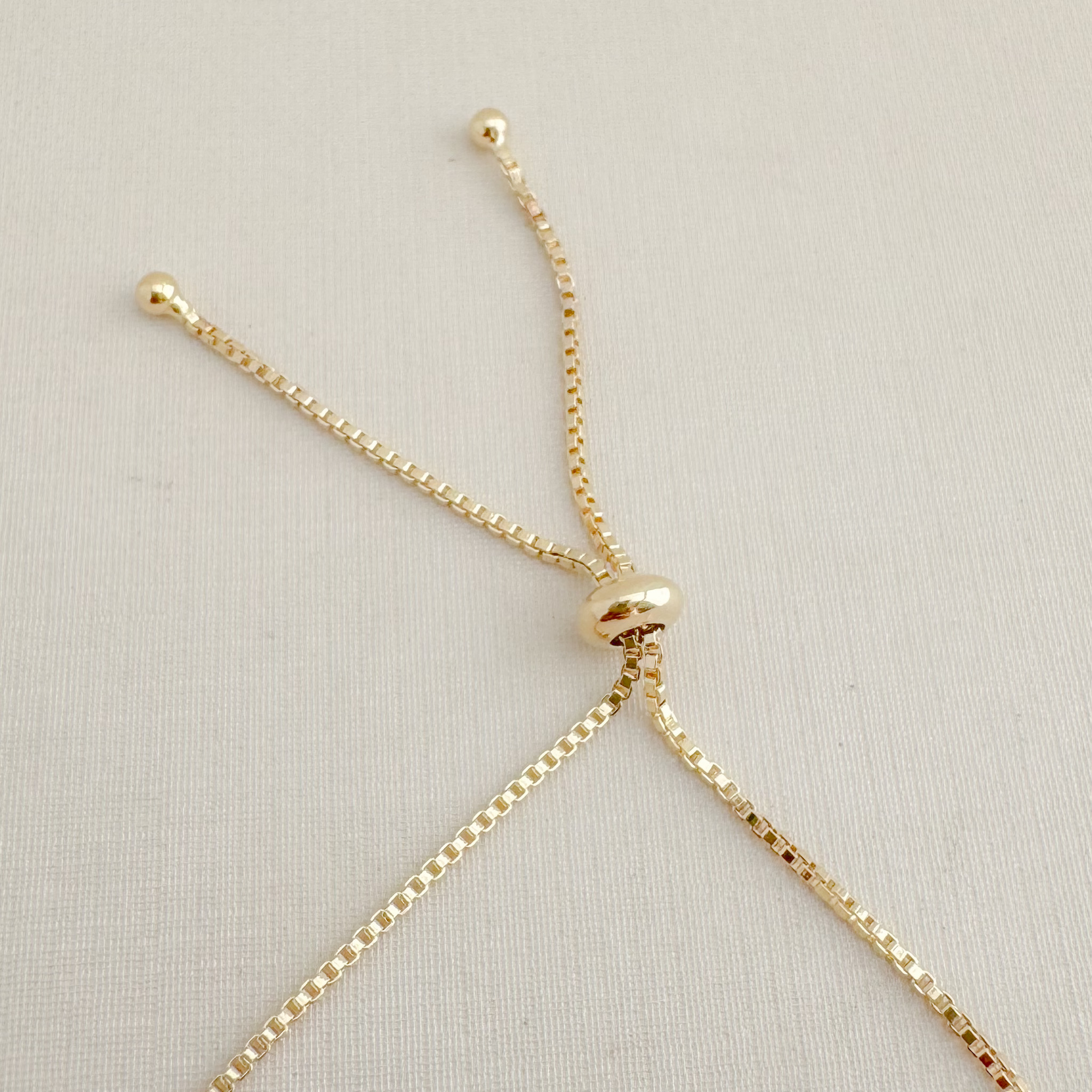 12.2218.1.O - Pulseira riviera de 3mm com fecho gravata tradicional