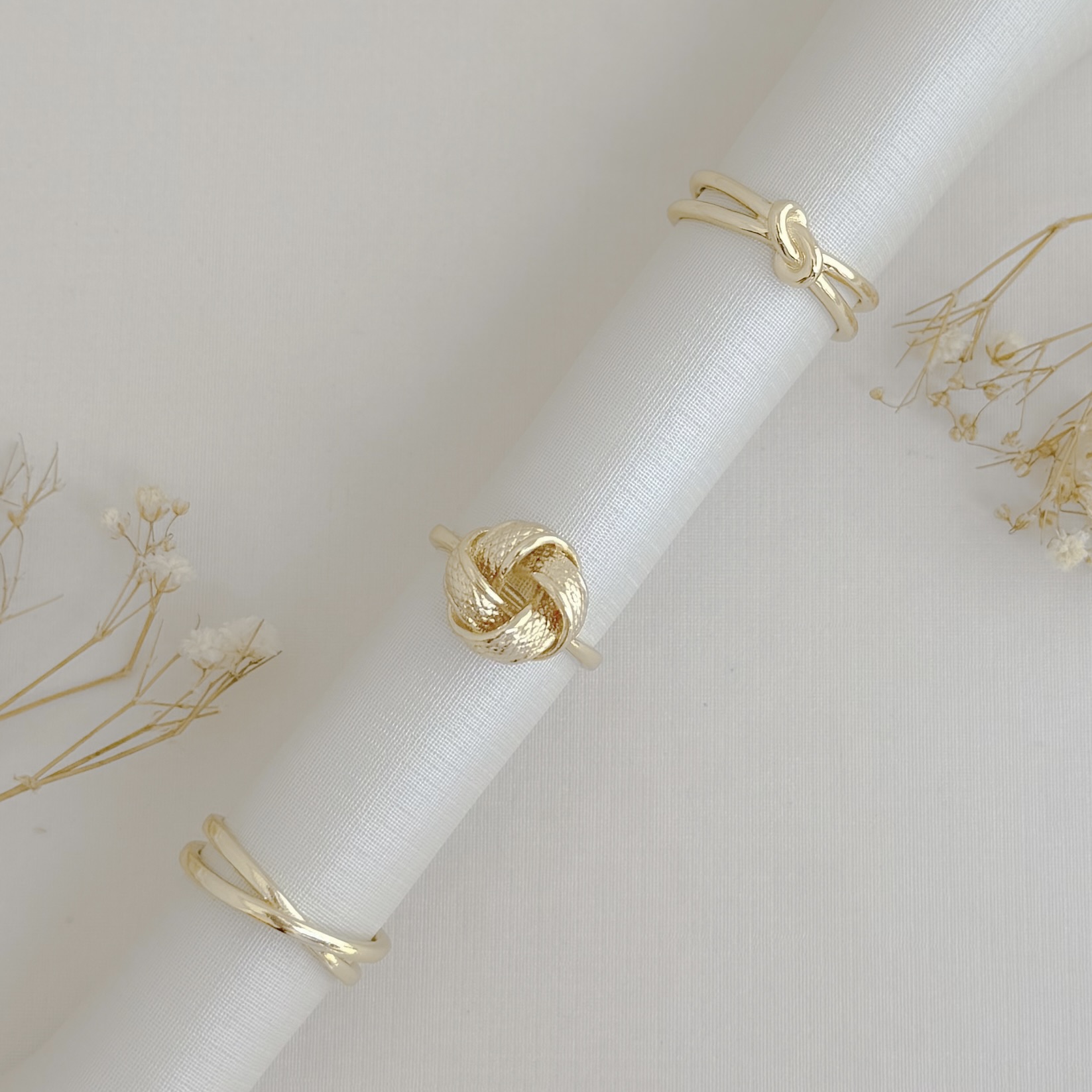 03.2517.0.O - (15) Anel de aro liso com fita trançada em espiral