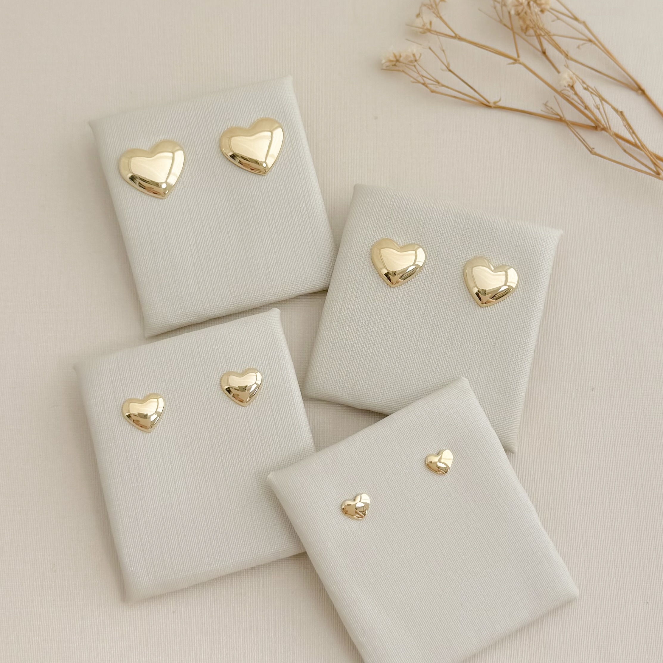 07.2752.0.O - (Tam.P) Brinco de coração abaloado liso simples