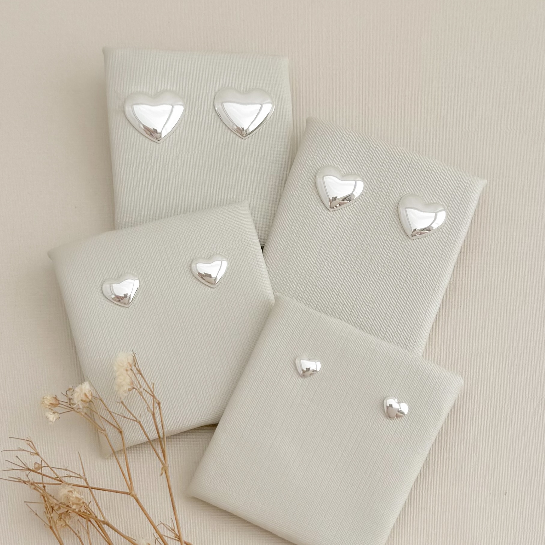 07.2752.0.S - (Tam.P) Brinco de coração abaloado liso simples