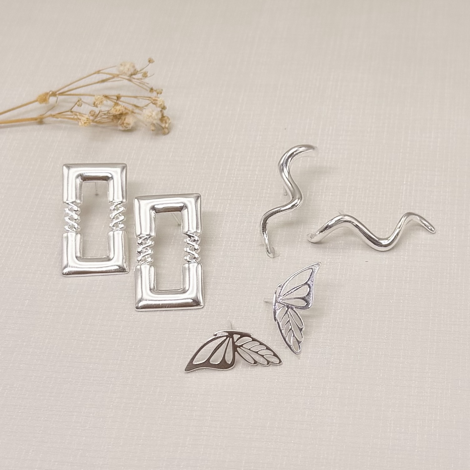 06.1314.0.S - Brinco cachos lisos.