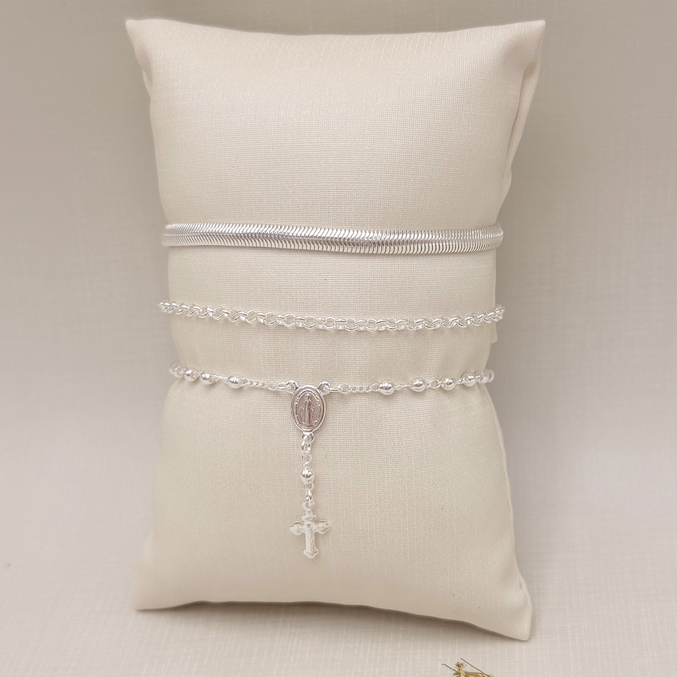 12.2254.0.S - Pulseira terço de bolinhas lisas.