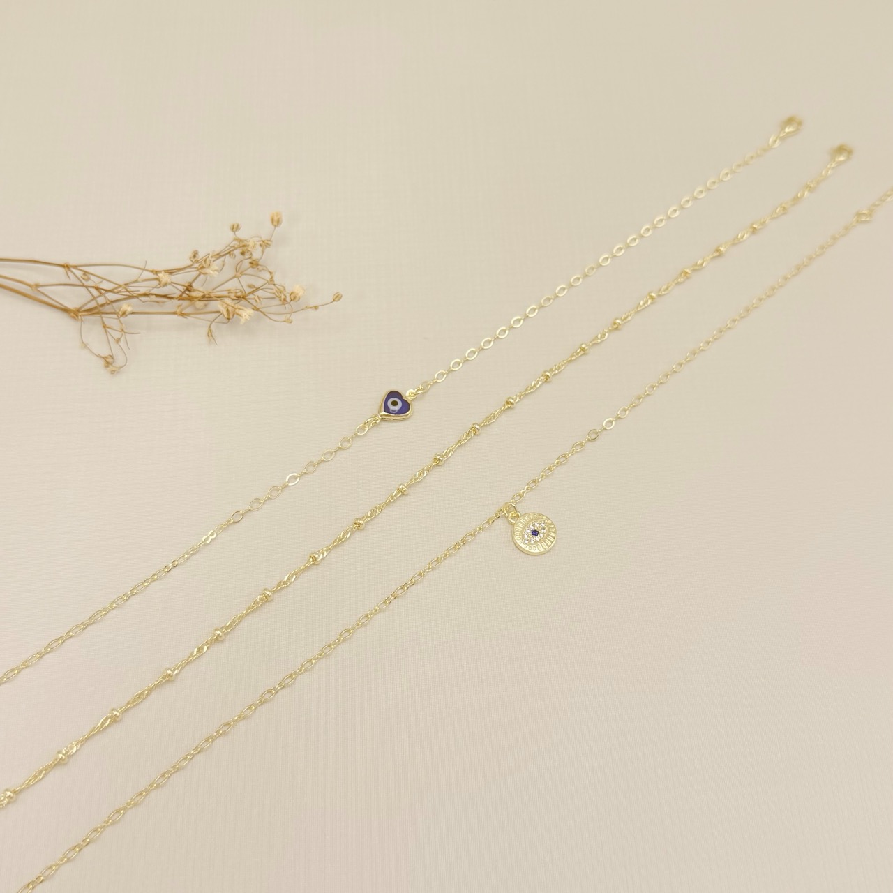 14.0334.0.O - Tornozeleira malha singapura com rondéis/rondel/bolinhas.