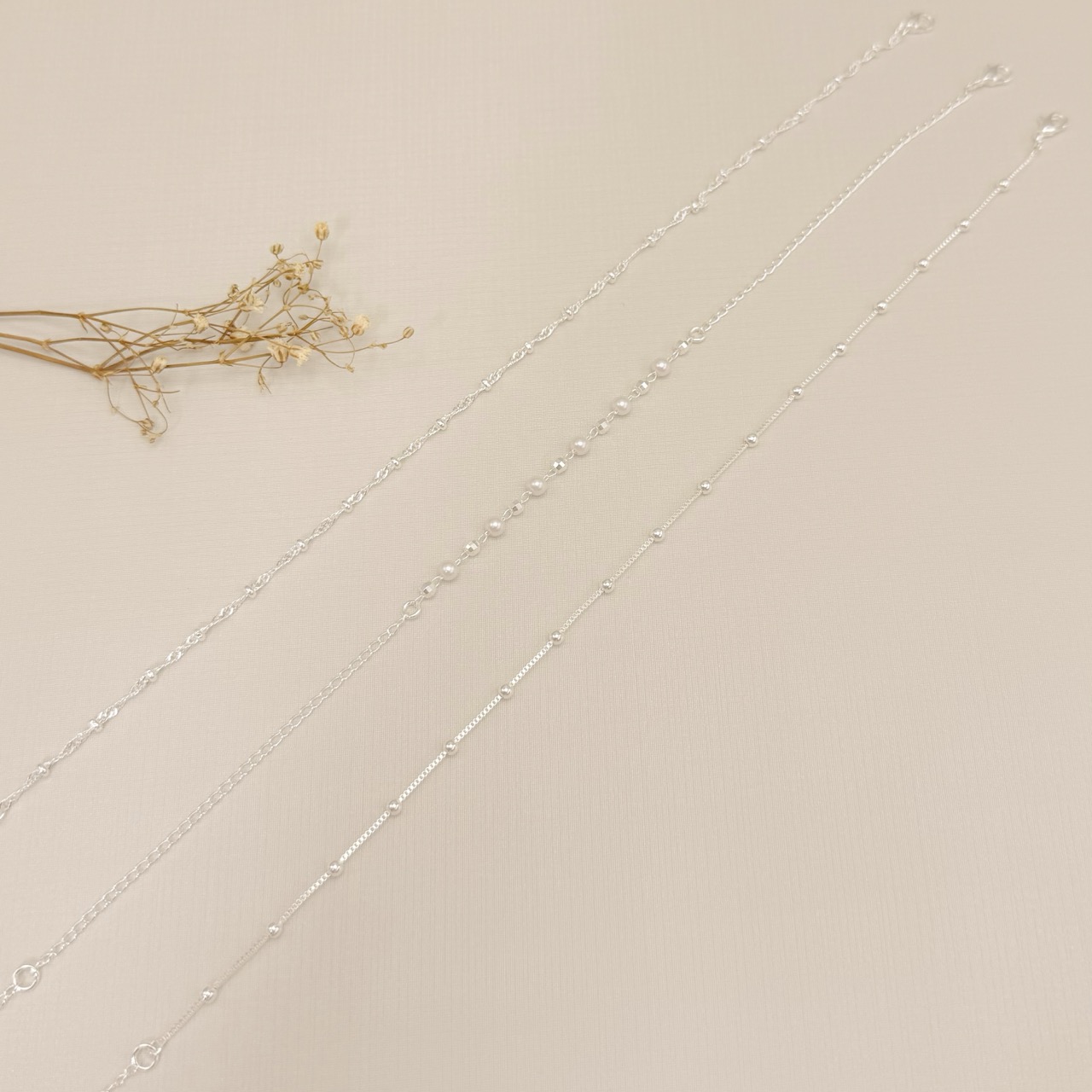 14.0334.0.S - Tornozeleira malha singapura com rondéis/rondel/bolinhas.