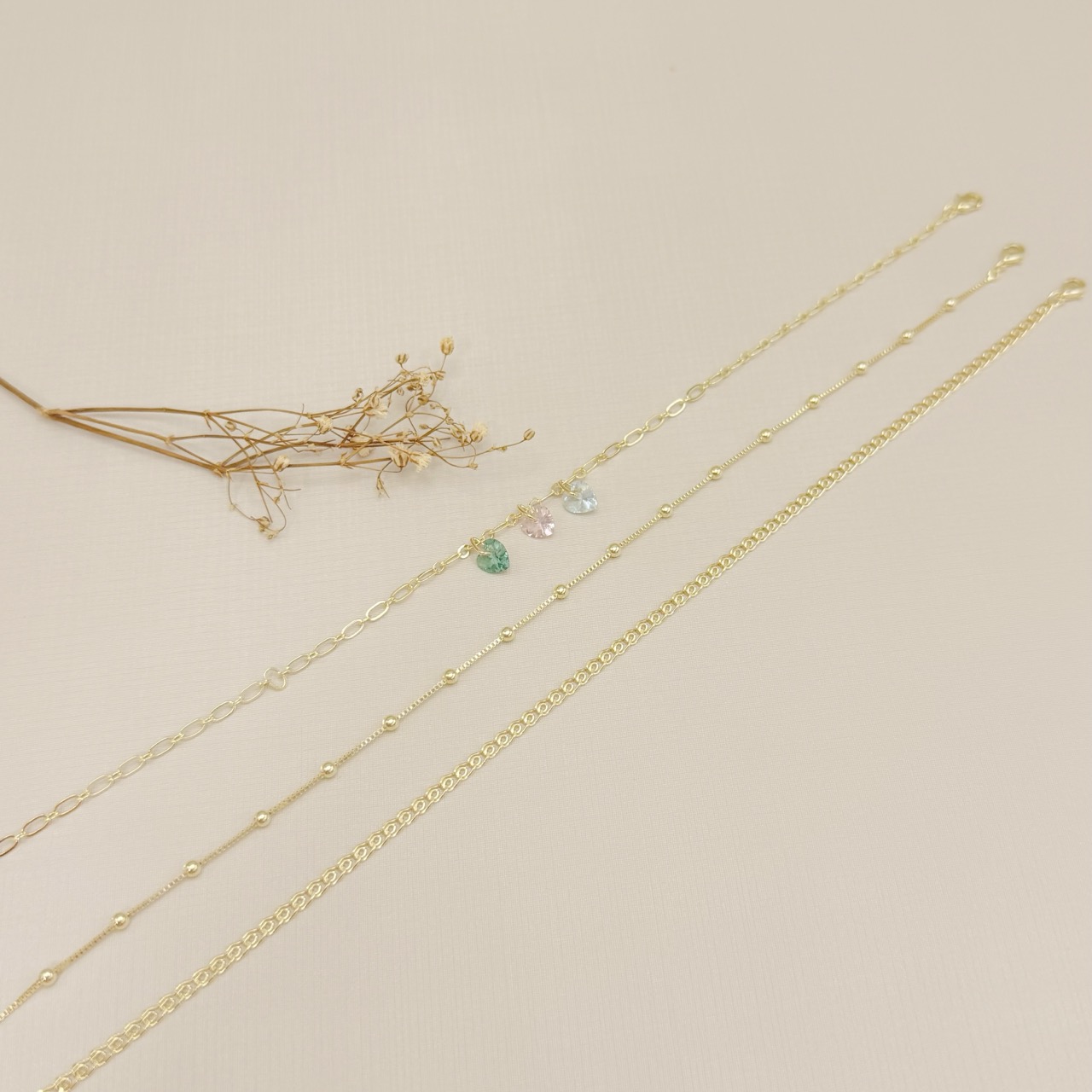 14.0313.0.O - Tornozeleira de veneziana com bolinhas lisas espaçadas