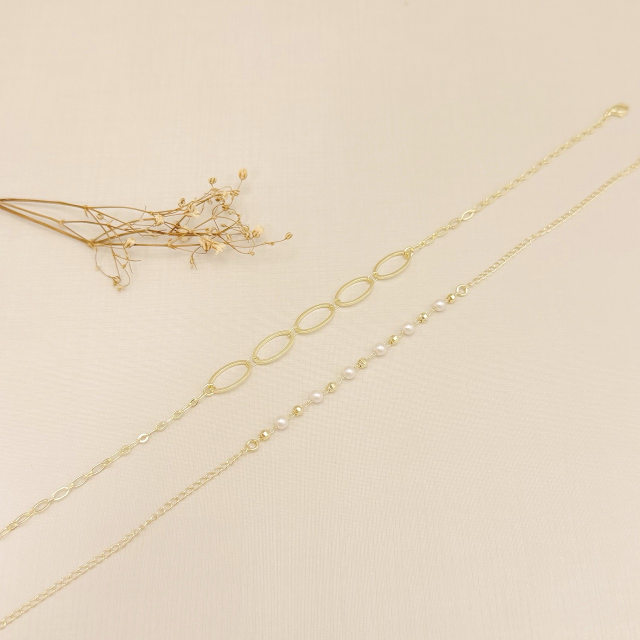 14.0316.15.O - Tornozeleira bolinhas disco intercaladas com pérola lisas