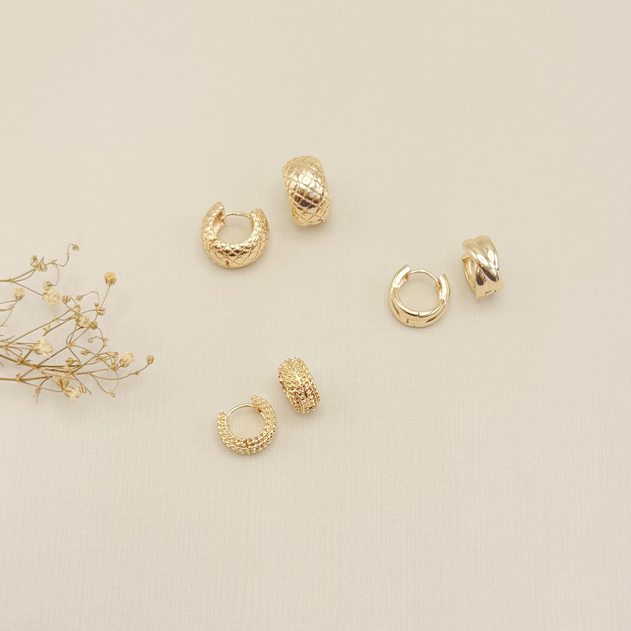 05.3112.0.O - Argola de forma X largo liso simples