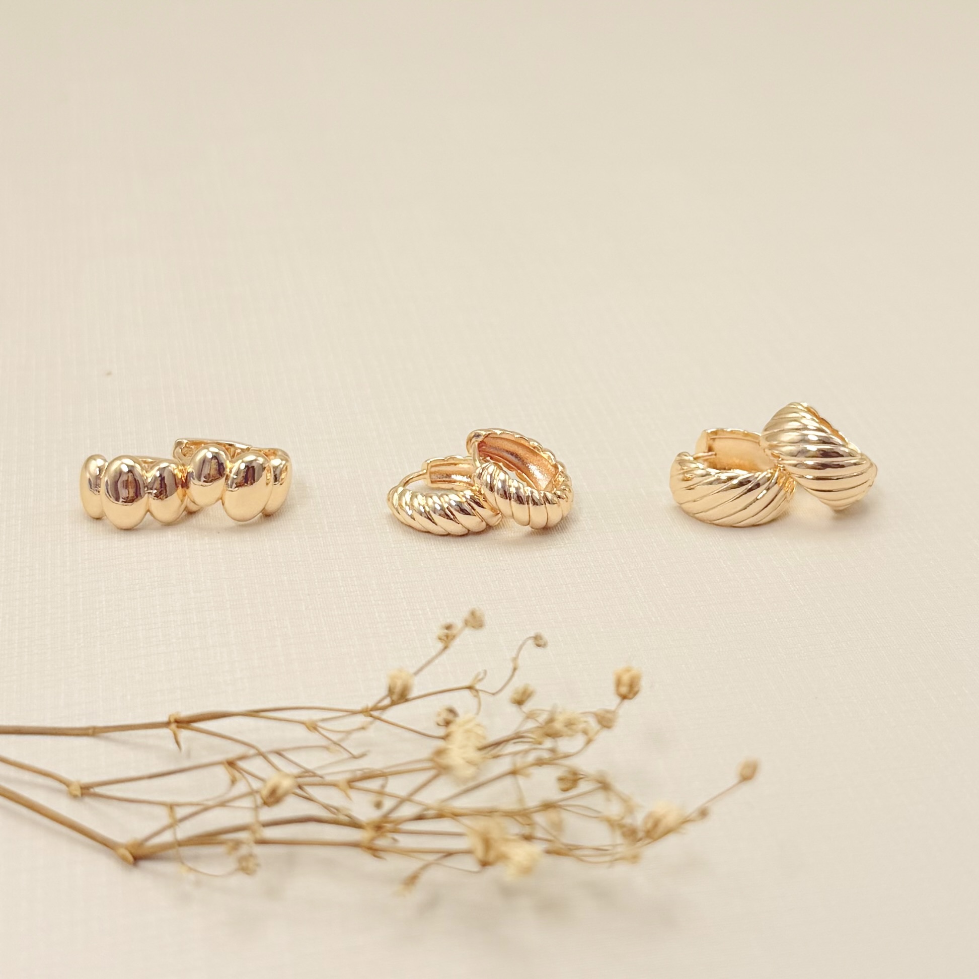 05.3131.0.O - Argola larga em efeito torcida simples