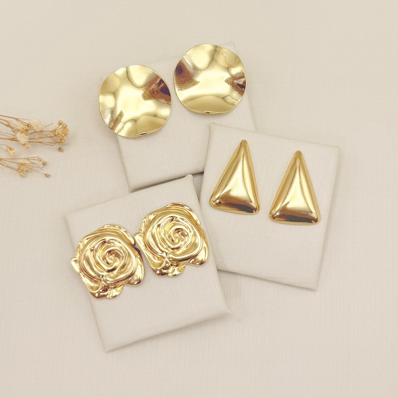 06.1338.0.O - Brinco de chapa circular em efeito orgânico liso