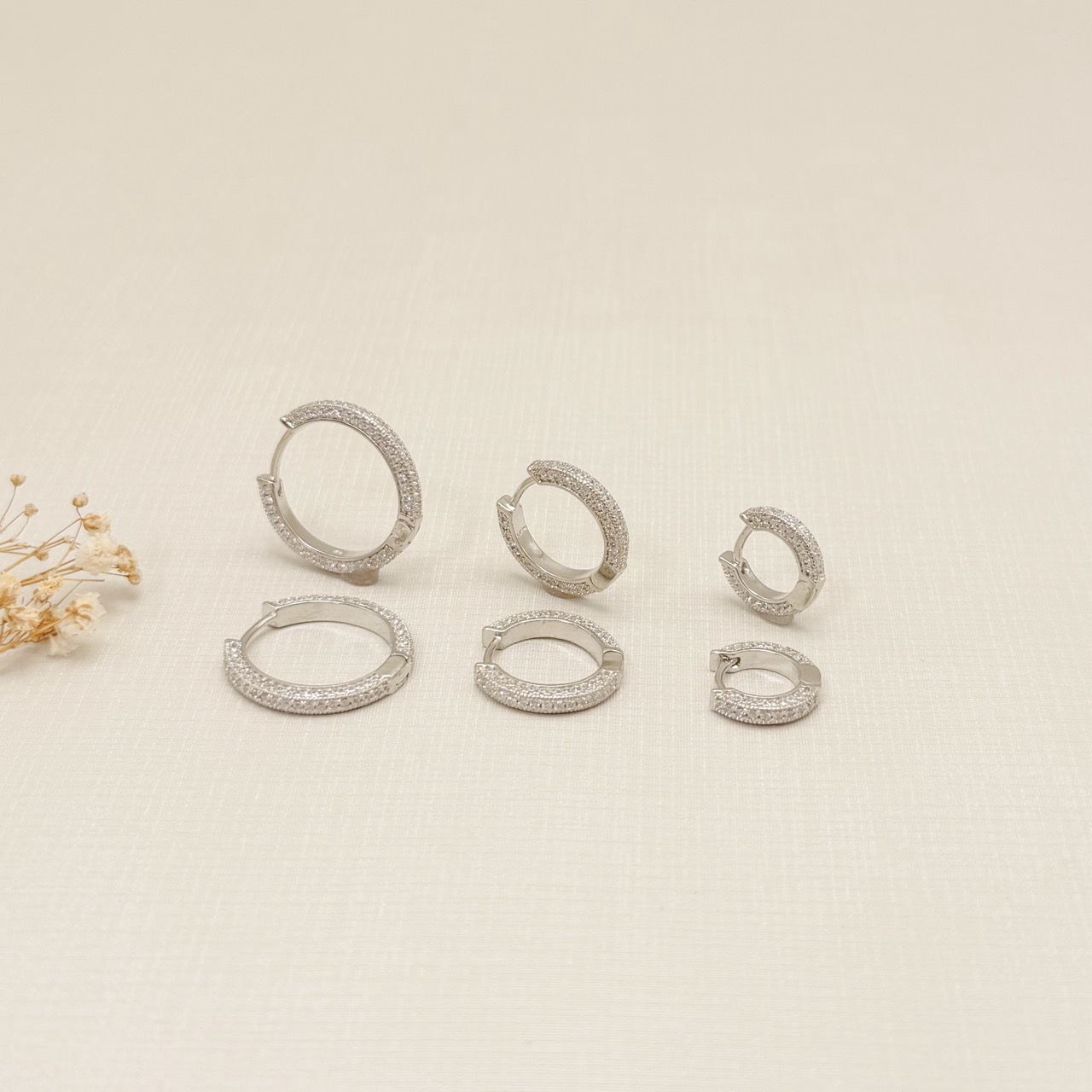 05.3141.1.B - (Tam.M) Argola circular com cravação frontal e lateral em frente e atrás