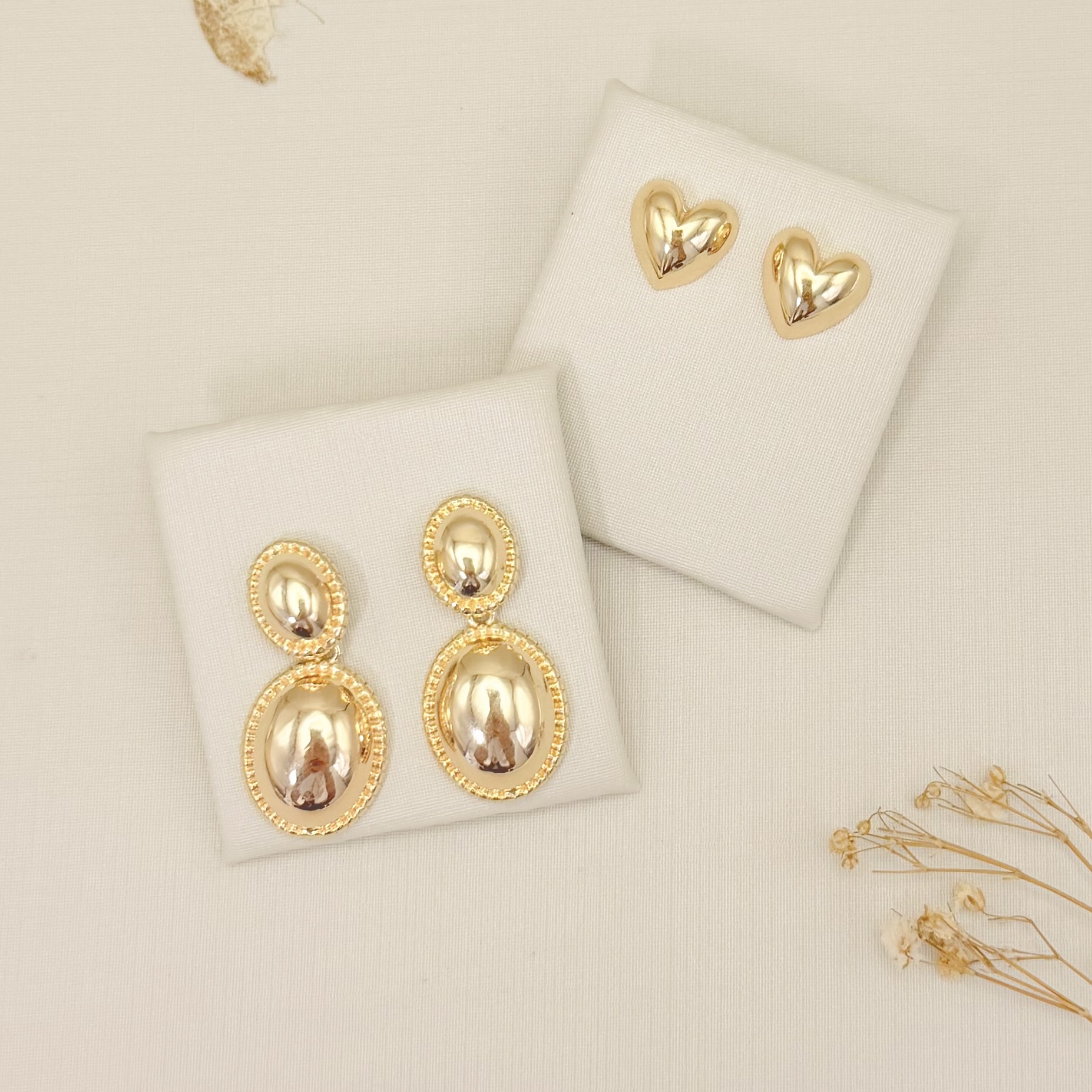 07.2780.0.O - Brinco de coração abaloado liso simples