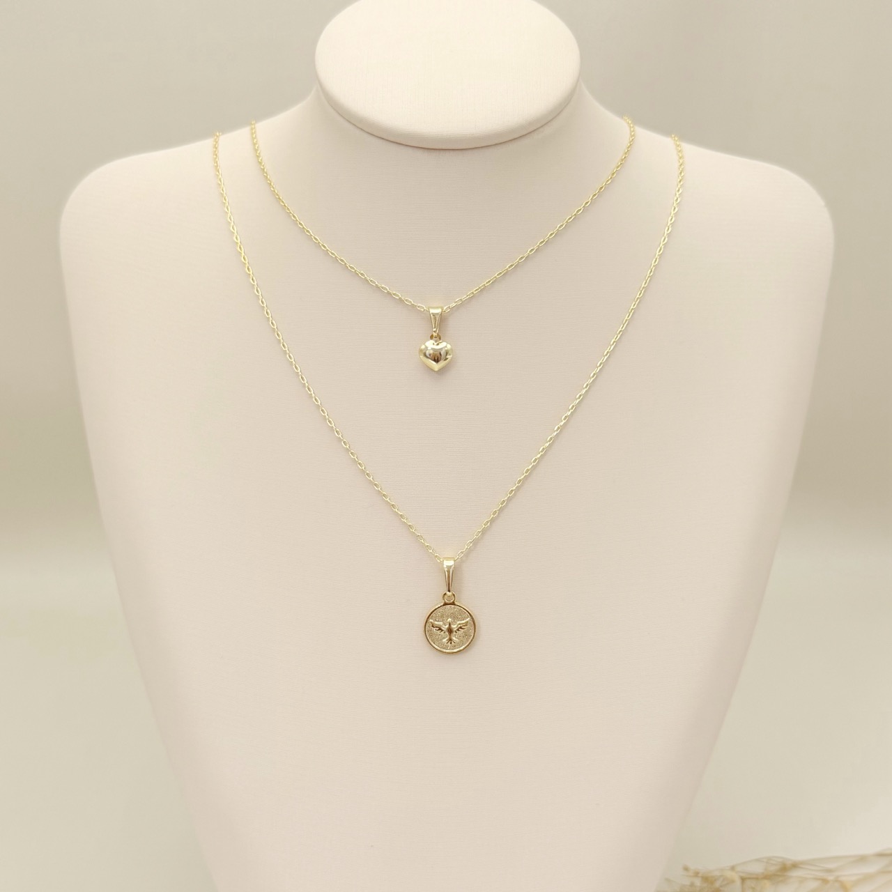 09.2463.0.O - (45) Colar de cartier com pingente coração abaloado liso