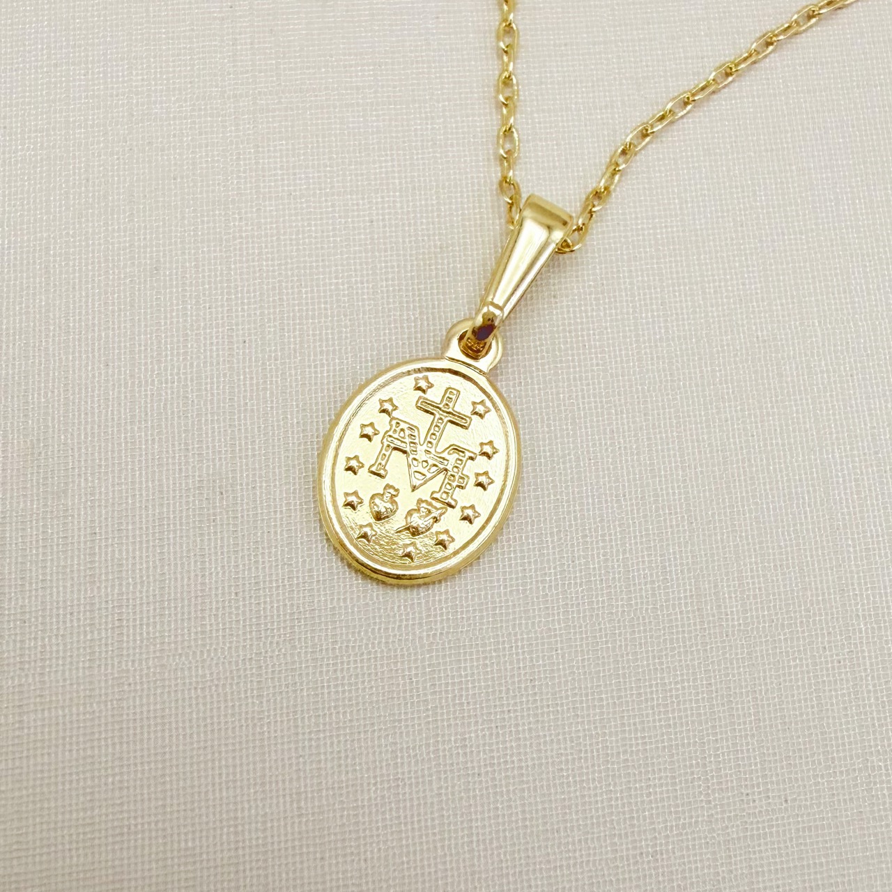 09.2464.0.O - (45) Colar de cartier com pingente oval de Virgem Maria