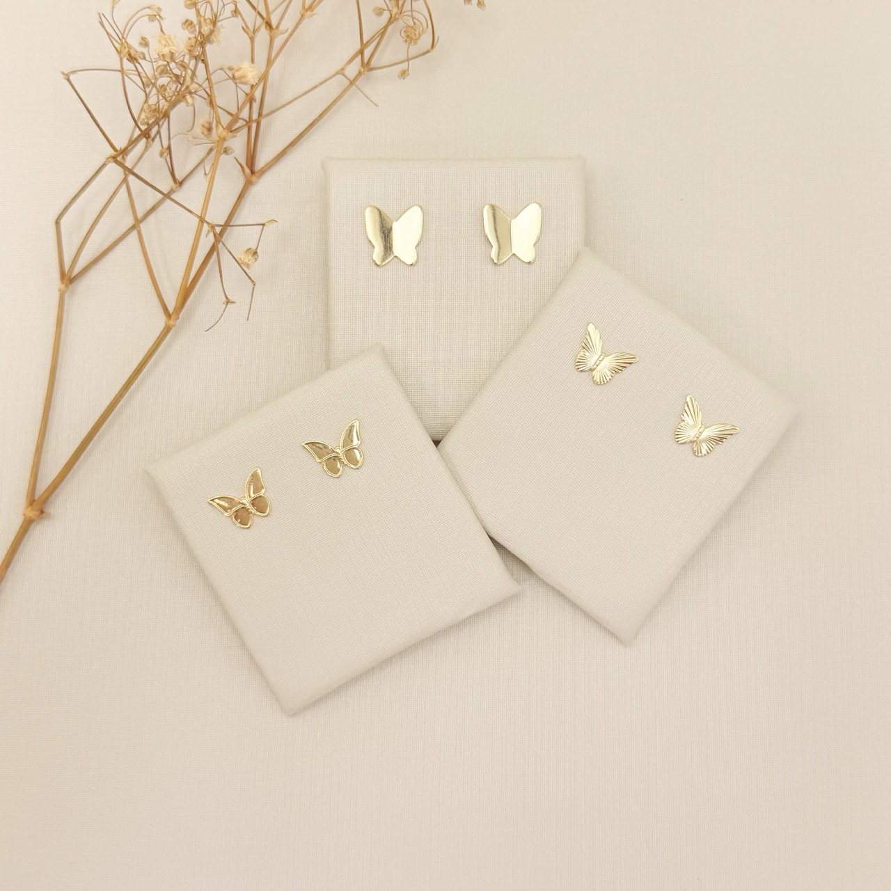 07.2880.0.O - Brinco de chapa em borboleta abstrata lisa