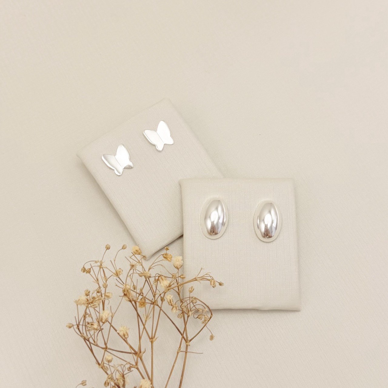 07.2880.0.S - Brinco de chapa em borboleta abstrata lisa