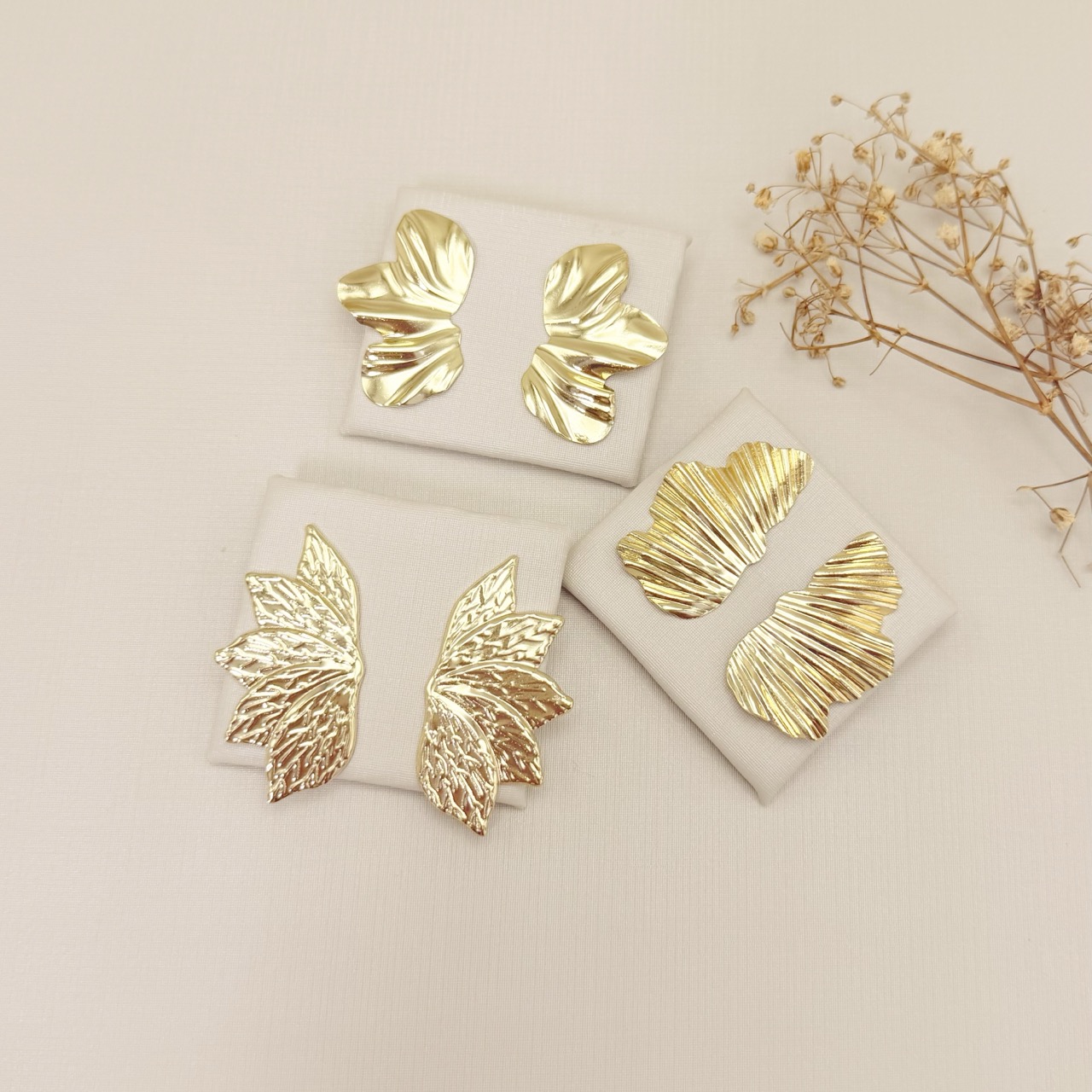 06.1364.0.O - Brinco de chapa em formato orgânico abstrato de efeito raios de sol