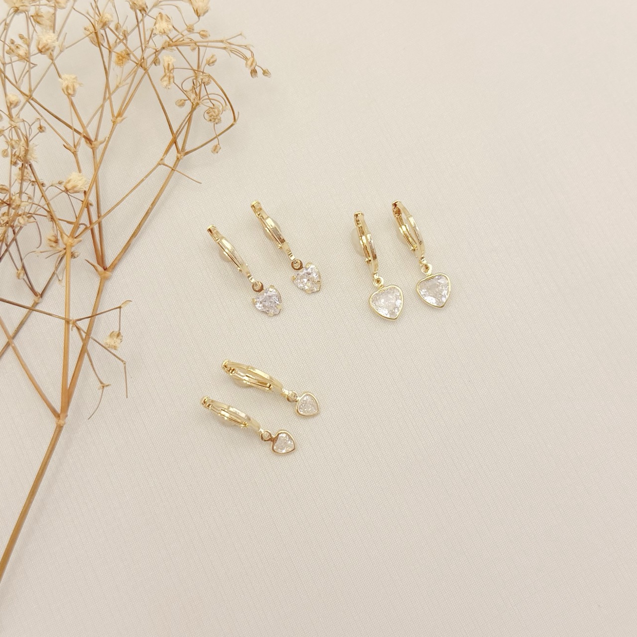 05.3152.1.O - Argola de pressão clássica com pingente de coração em cravação garras