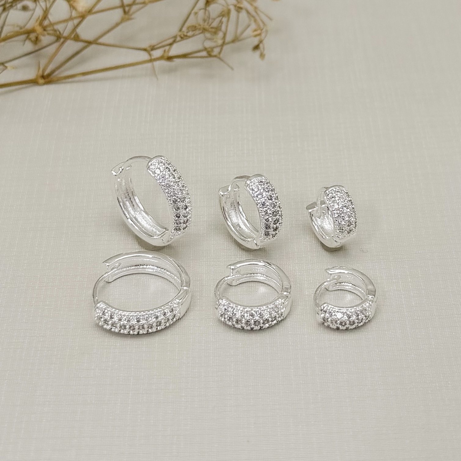 05.3171.1.S - (Tam.G) Argola clássica de cravação xadrez frontal